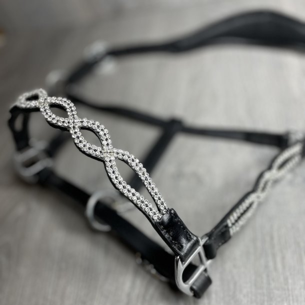 Ldergrime med udskringer og hvide sten